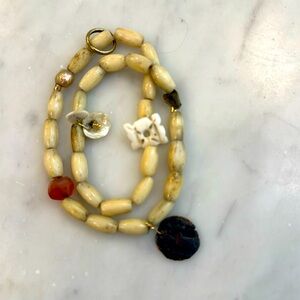 Beautiful Suzan bracelet… With antique coins, ivory and pearl small gold detail.